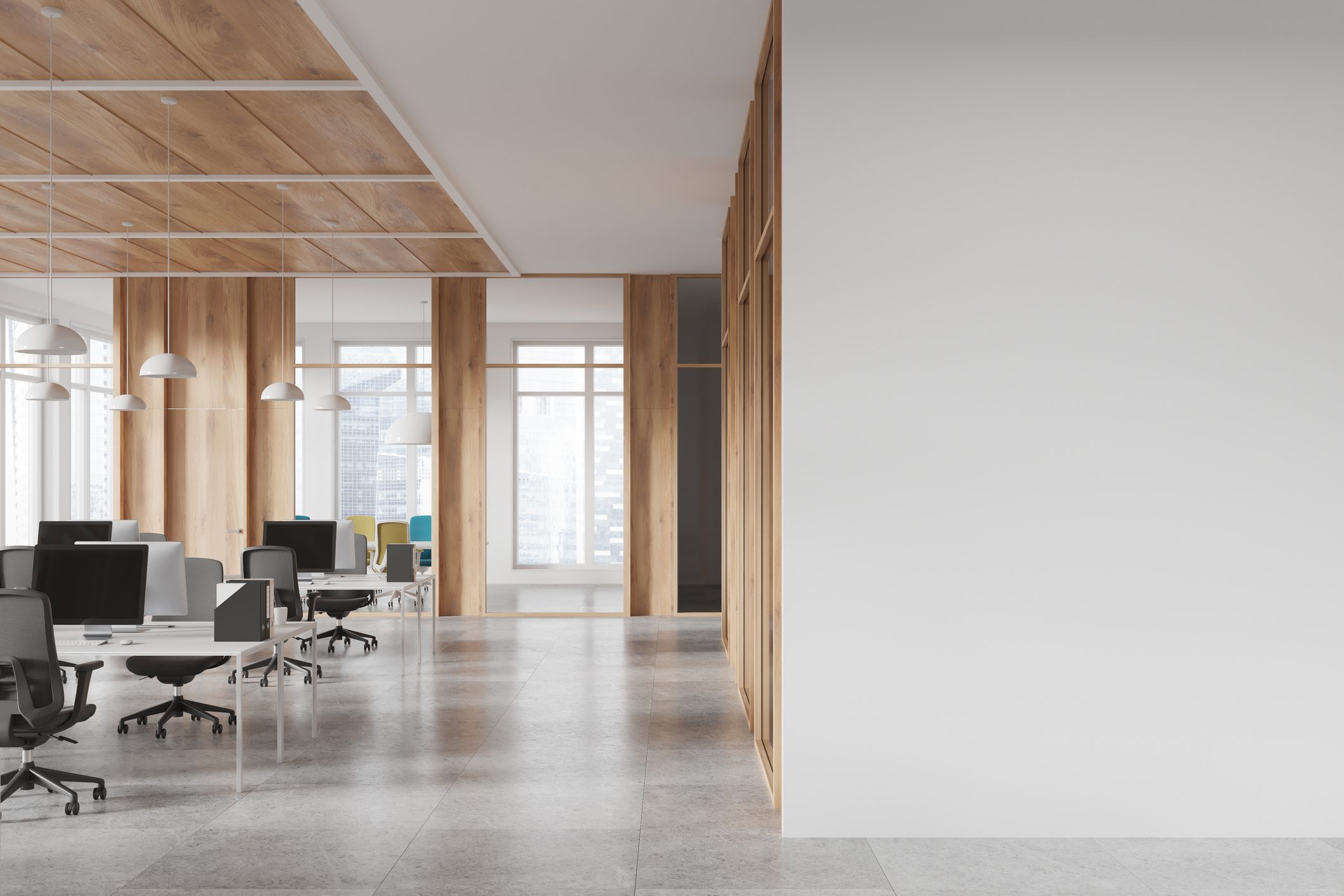 Modern office space with wooden accents and natural light.